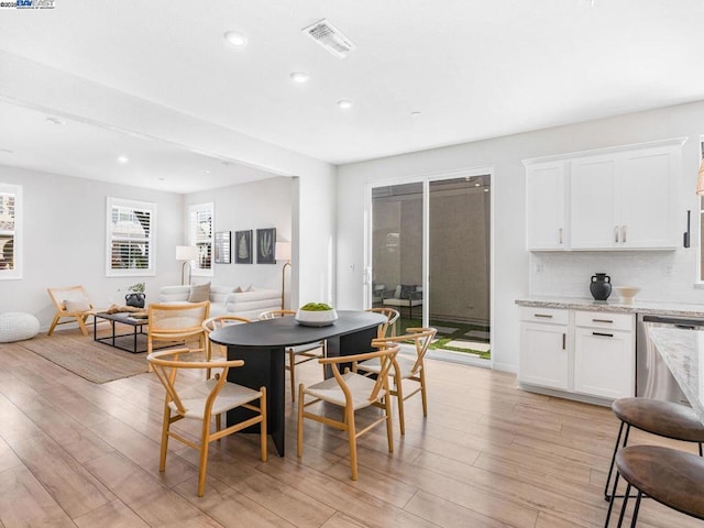 dining room featuring light hardwood / wood-style floors