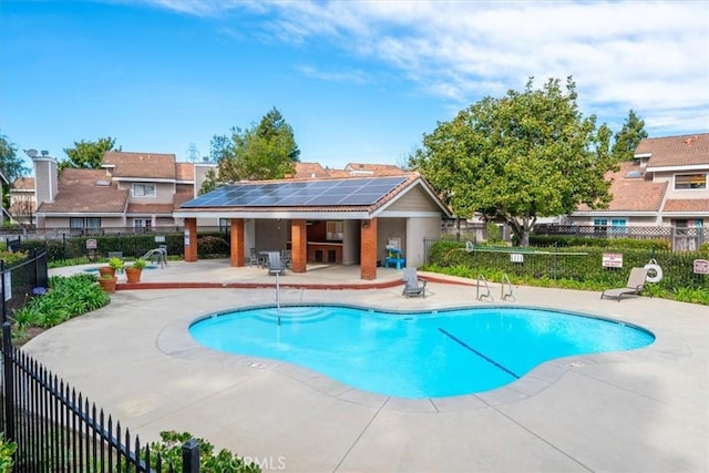 view of swimming pool featuring a patio