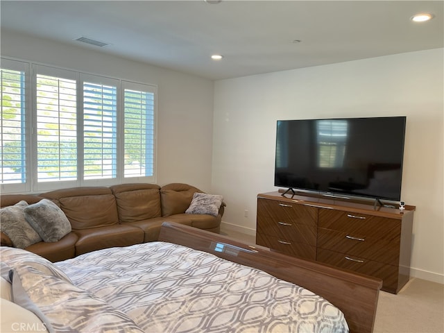 bedroom featuring baseboards, visible vents, and recessed lighting