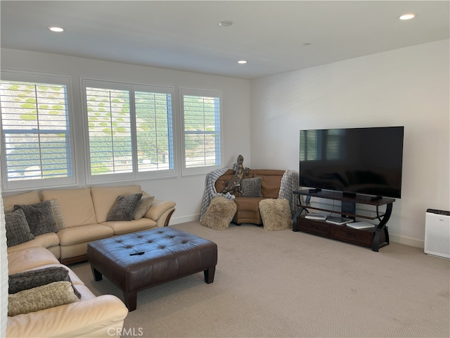 carpeted living room with baseboards and recessed lighting