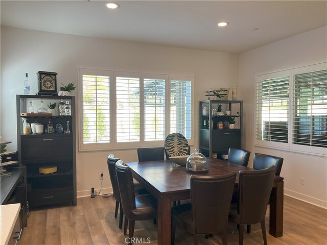 dining room featuring light wood-type flooring