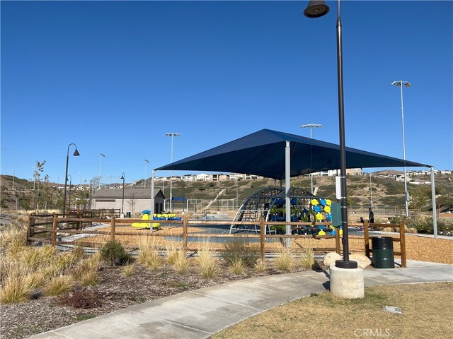 view of property's community featuring a playground