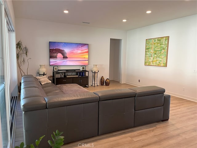 living room with light hardwood / wood-style floors