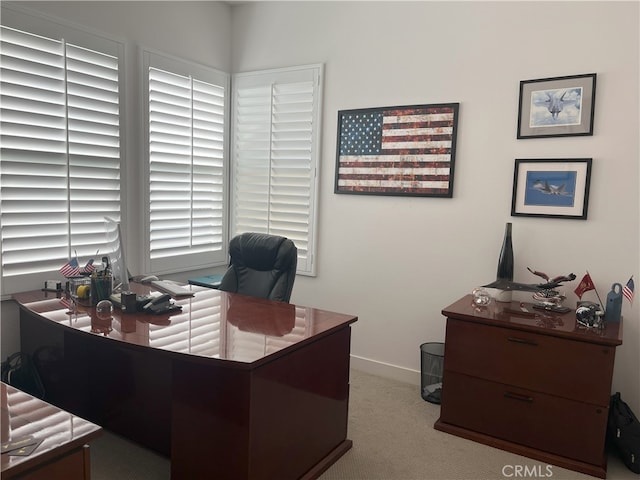 view of carpeted office space