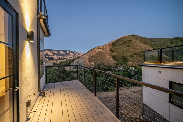 deck featuring a mountain view