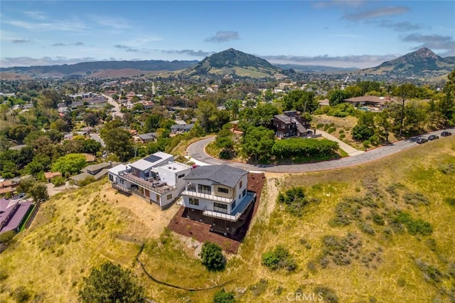 drone / aerial view featuring a mountain view