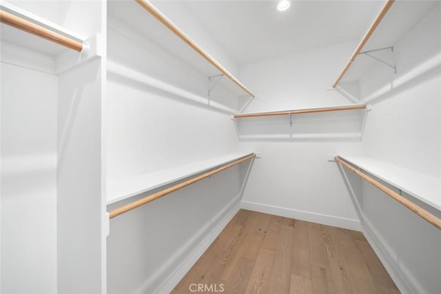 walk in closet featuring light wood-type flooring