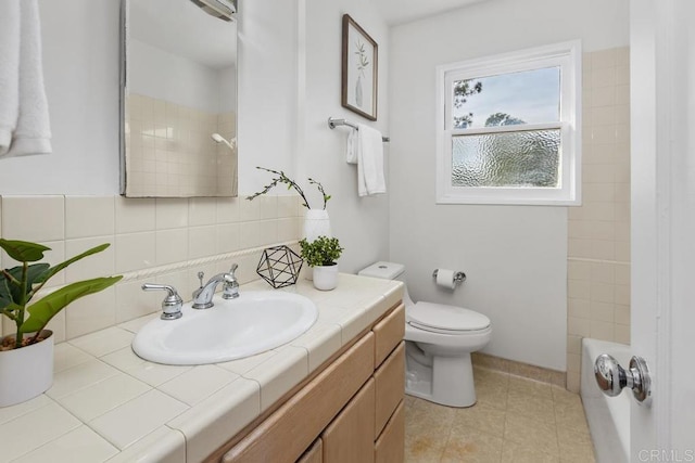 full bathroom with decorative backsplash, washtub / shower combination, toilet, and vanity