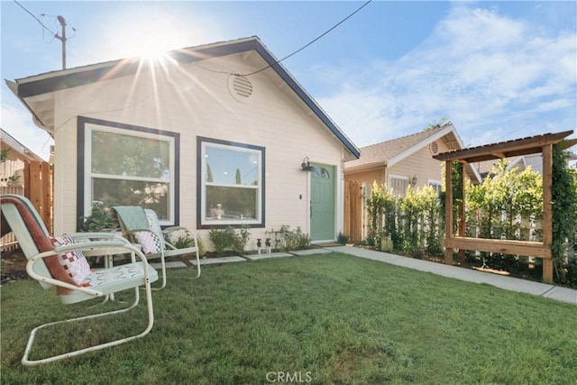 view of front of home with a front lawn