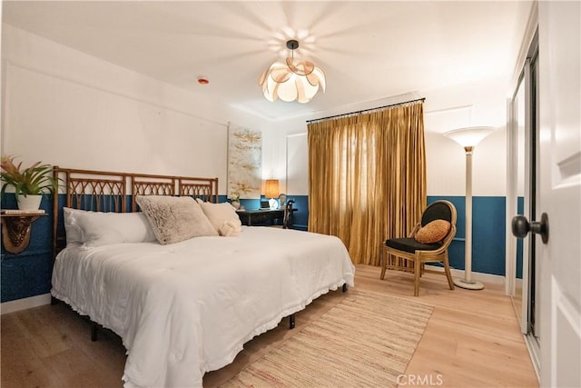 bedroom featuring hardwood / wood-style flooring