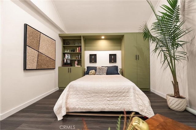 bedroom featuring dark hardwood / wood-style floors