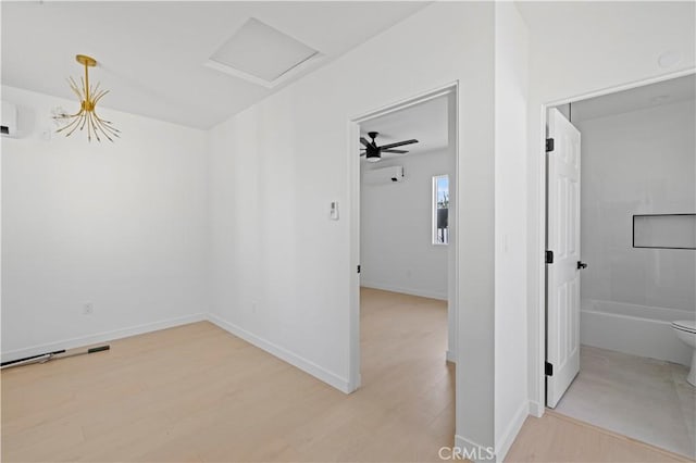 interior space with ceiling fan and light hardwood / wood-style floors