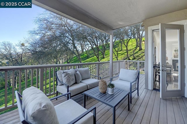 deck featuring an outdoor living space