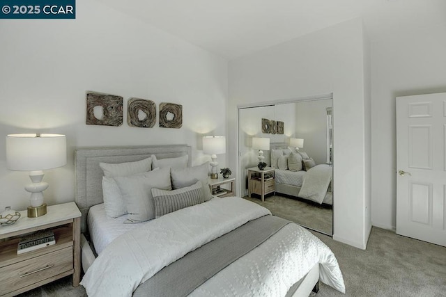 carpeted bedroom featuring a closet