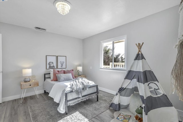 bedroom featuring hardwood / wood-style flooring