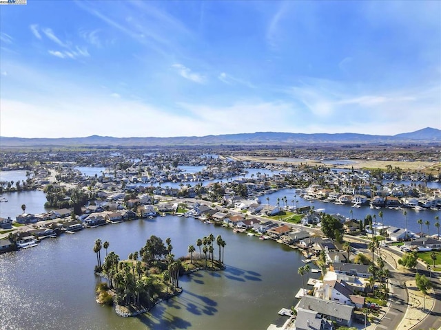 bird's eye view featuring a water and mountain view