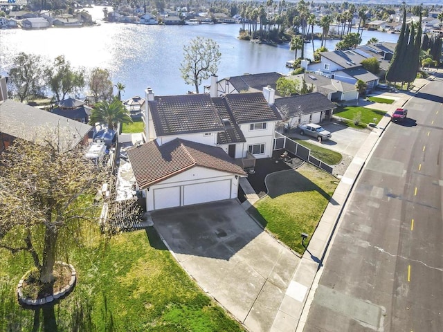 drone / aerial view with a water view