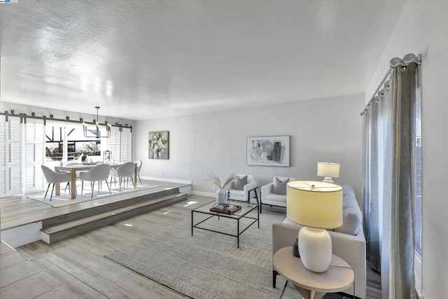 living room with light hardwood / wood-style floors