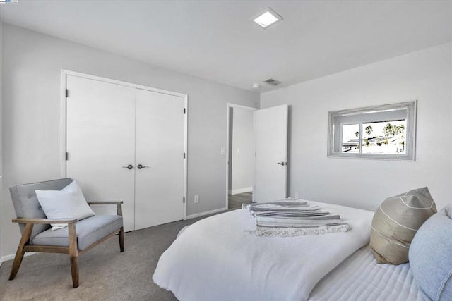 bedroom with a closet and carpet floors