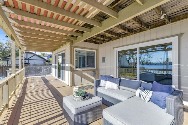 wooden terrace with outdoor lounge area