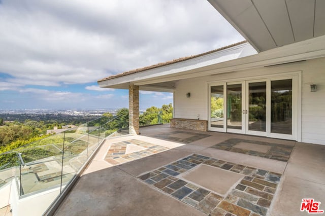 view of patio featuring french doors