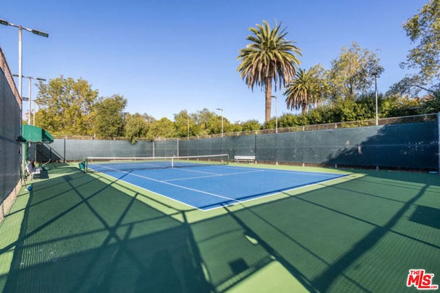 view of tennis court with basketball court