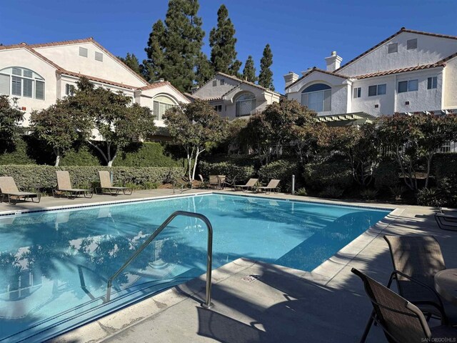 view of pool with a patio area