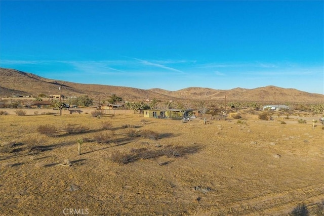 view of mountain feature with a rural view