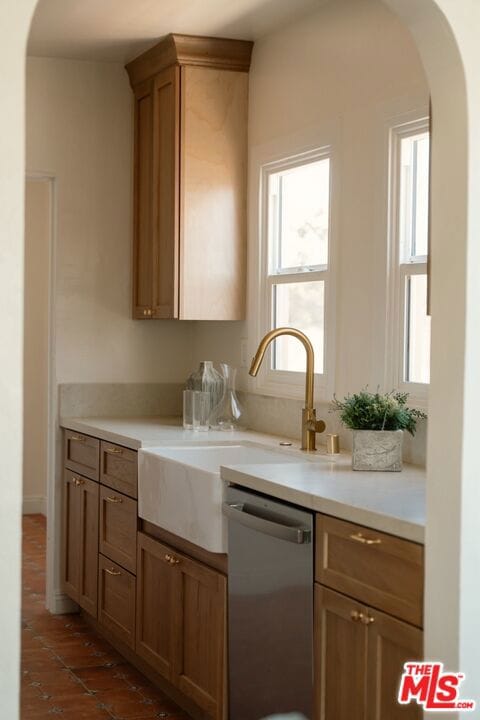 kitchen with dishwasher and sink