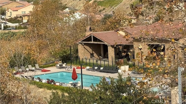 view of swimming pool featuring a patio