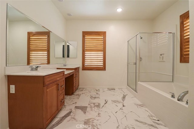 bathroom featuring plus walk in shower and vanity