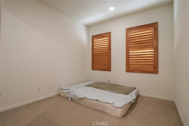 unfurnished bedroom with carpet