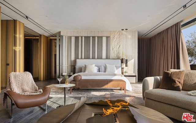 bedroom featuring wood-type flooring