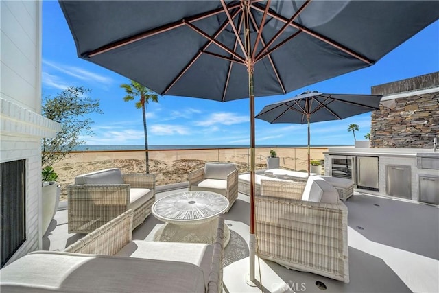 view of patio with an outdoor hangout area and area for grilling