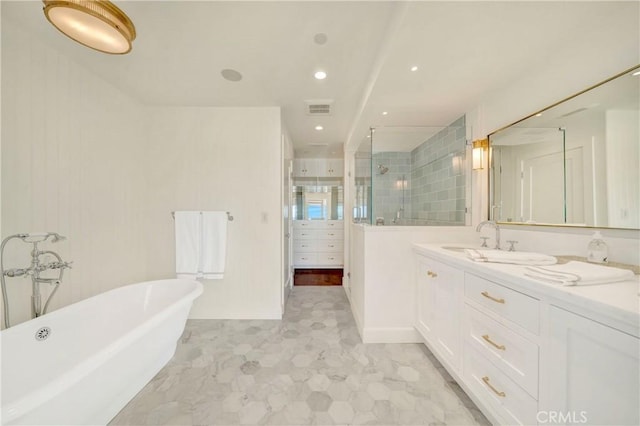 bathroom with separate shower and tub and vanity