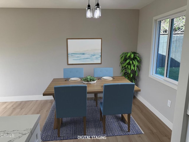 dining room with light wood-type flooring