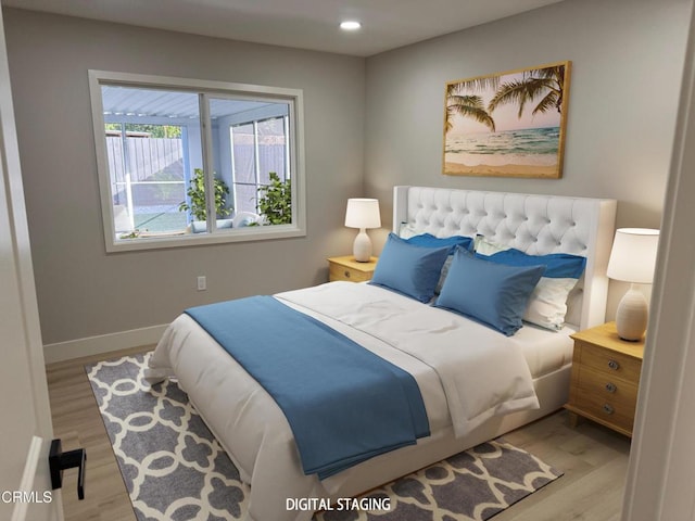 bedroom featuring light wood-type flooring