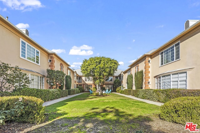 view of community with a lawn