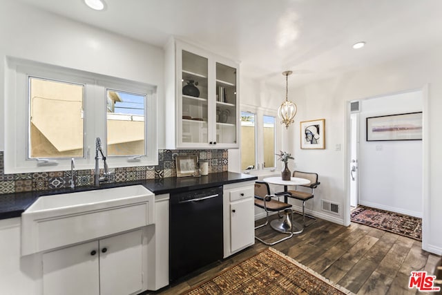 kitchen with decorative light fixtures, dark wood-type flooring, white cabinetry, and dishwasher