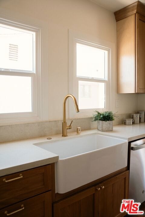 kitchen with sink and dishwasher