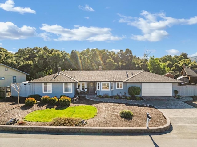 ranch-style home with a garage