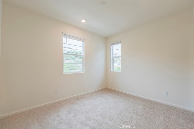 empty room featuring carpet floors