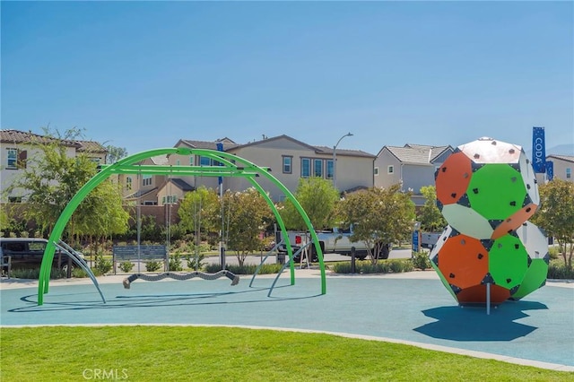 view of playground with a yard