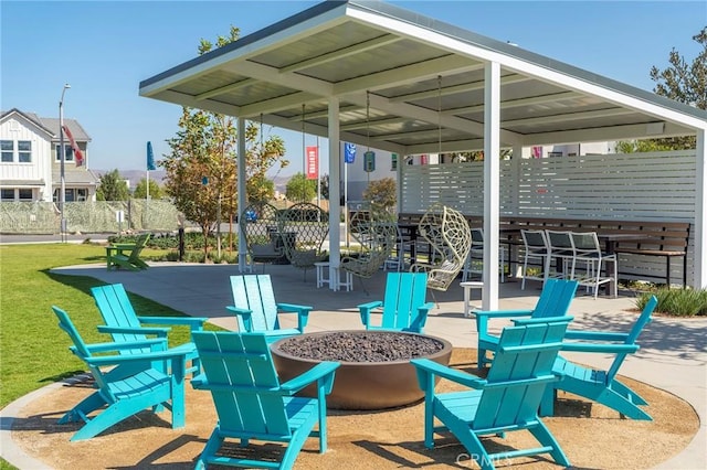 view of patio with an outdoor fire pit