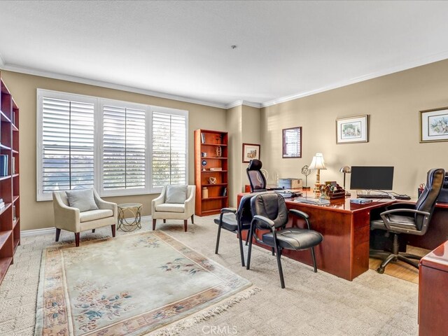 office area featuring baseboards and crown molding