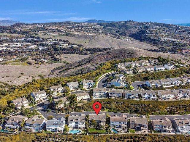 bird's eye view featuring a residential view and a mountain view