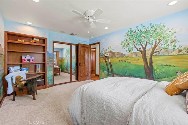 carpeted bedroom featuring ceiling fan