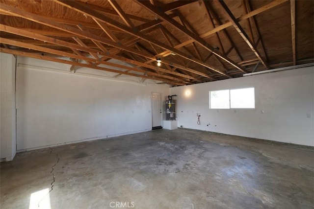 garage with strapped water heater