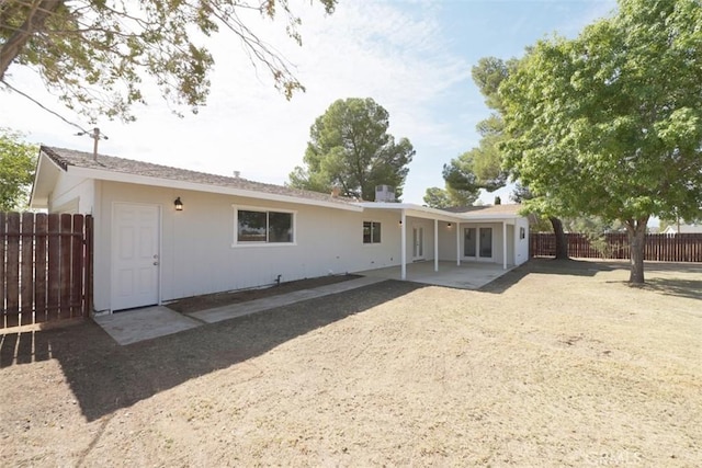 back of house featuring a patio area