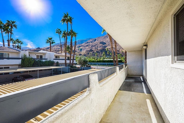 balcony featuring a mountain view